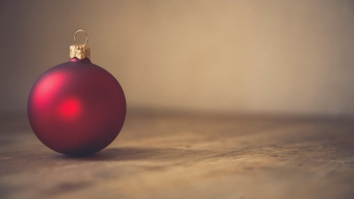 A red christmas ball ornament. 
